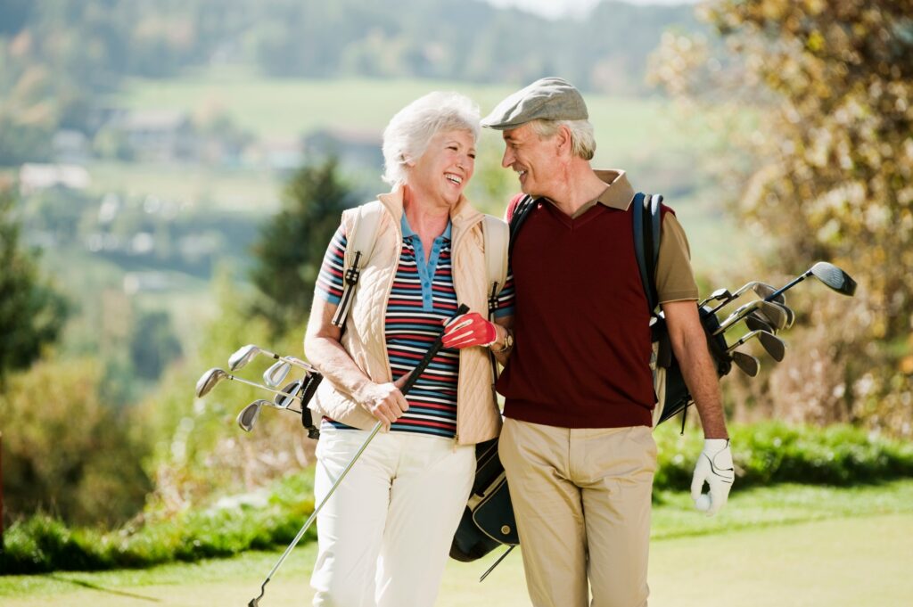 Couple playing golf